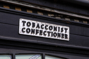Obraz premium Vintage Tobacconist Sign in Thaxted, Essex