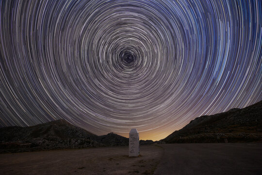 Star-Trails photography oriented north and the polar star in the center of the frame in the Alto de Angliru, Asturias, Spain