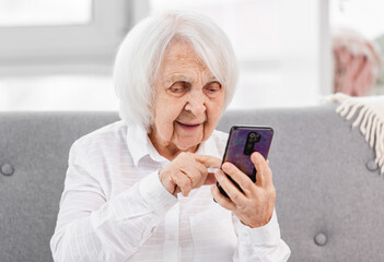 Elderly woman with smartphone