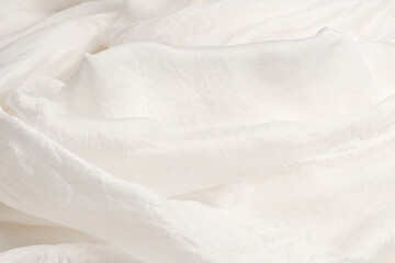 Soft smooth white silk fabric background. Fabric texture.