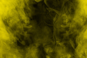 Yellow steam on a black background.