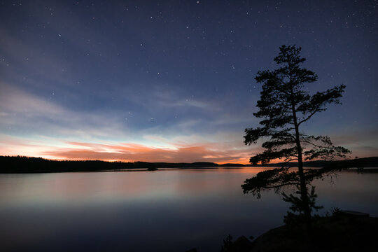 Sunset over a lake in western Sweden