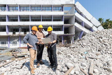 Demolition control supervisor and contractor discussing on demolish building.