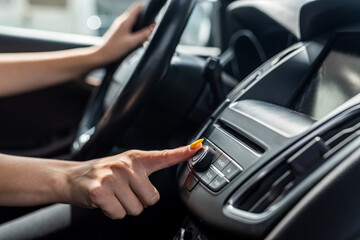 Naklejka premium female hand close up in car