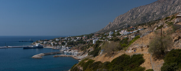 Fototapeta na wymiar Panoramic view to the port of Agios Kirikos, Ikaria, Greece
