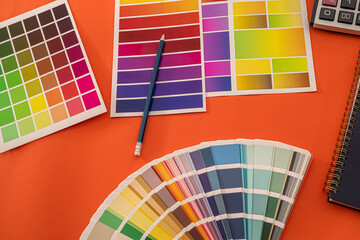 on a monochrome background color palettes, samples and near them the handle are laid out