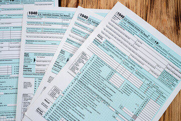 Obraz premium many American tax forms 1040 are mixed