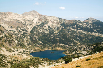 Fototapeta na wymiar View from Jano peak to Popovo lake and mount Polejan in Pirin National Park, Bulgaria