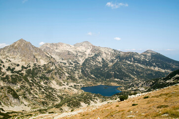 Fototapeta na wymiar View from Jano peak to Popovo lake, mount Polejan and Jangal in Pirin National Park, Bulgaria