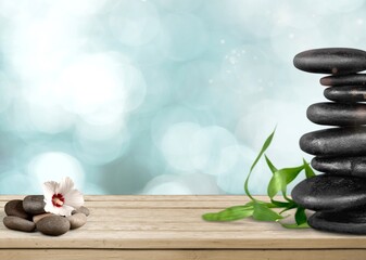 Background for cosmetic products of natural stone podium with flowers.
