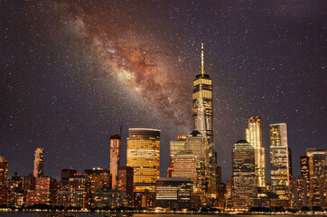 City Skyline at night under sky filled with start