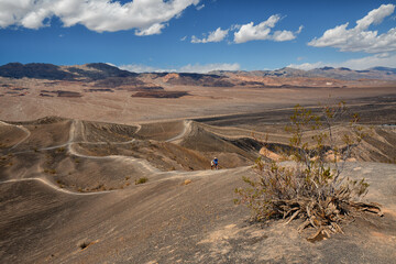 Desert hiking, Death Valley National Park. Amazing volcanic landscape, Ubehebe Crater view point.