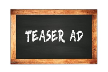 Fototapeta premium TEASER AD text written on wooden frame school blackboard.