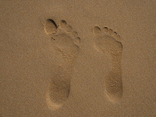Fototapeta na wymiar sand texture on the sea beach, sand, prints