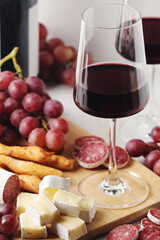 Red wine in a transparent white glass	