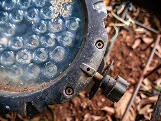 dirty and rusty garden lighting due to frequent exposure to hot and rainy weather for a long time
