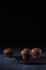 Minimalist three cupcakes in low key
