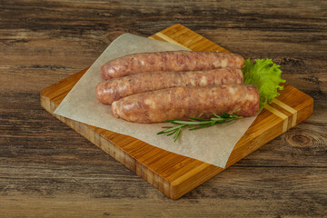 Raw pork meat sausages for grill