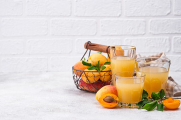 Apricot juice in glass. Healthy drink