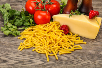 Italian pasta raw Maccheroni for cooking