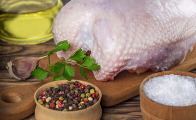 fresh chicken meat with herbs and pepper