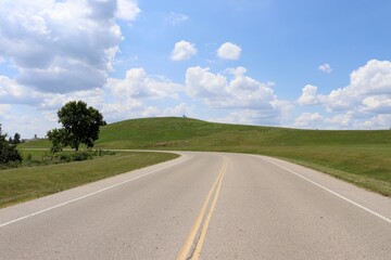 Fototapeta premium The empty road in the country on a sunny day.