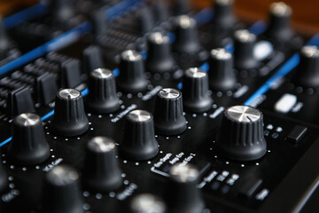 Fototapeta na wymiar Analog synthesizer regulators. Professional audio equipment for electronic musical production in sound recording studio 
