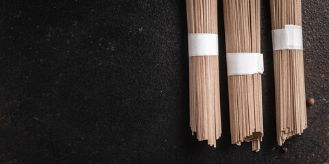 soba buckwheat raw noodles ready to cook meal snack on the table copy space food background 