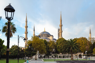 Fototapeta na wymiar Blue Mosque, Sultan Ahmet Mosque, at dawn. The view of architecture, garden and facade in old town, Istanbul, Turkey