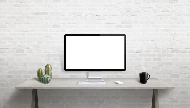 Computer display mockup on work desk. Blank display for text promotion