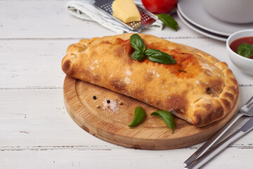 traditional closed italian pizza calzone