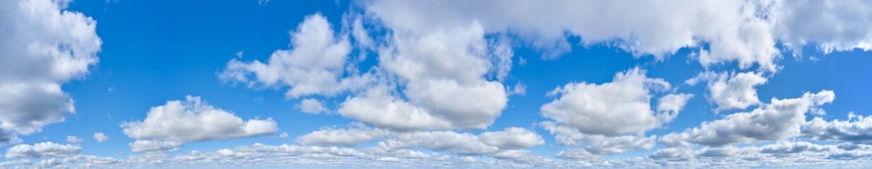 Fototapeta premium Large panorama of bright blue sky with clouds