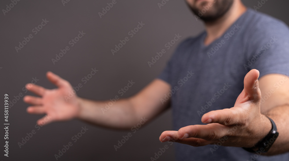 Poster man showing his empty hand.