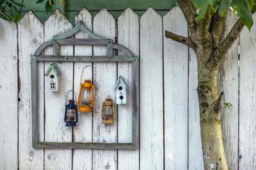 Rustic symbolic painting on a wooden fence