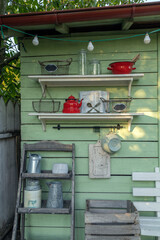 Rustic arrangement with retro dishes and kitchen accessories