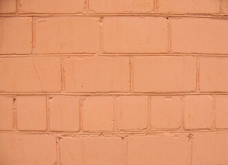 Obraz premium Brick wall. Background. The brick is painted orange.