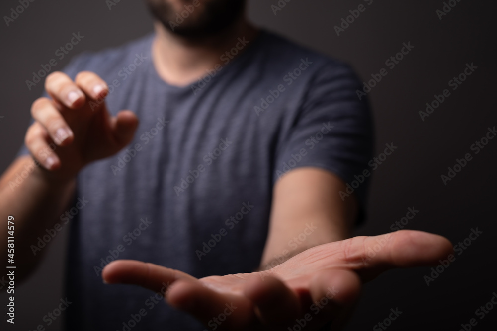 Poster man showing his empty hand.
