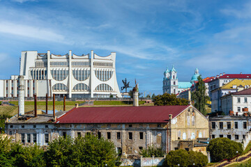 Summer panorama of Grodno - an abandoned brewery in the foreground, a Drama theater building in the middle plan and a Catholic Farny Church in the background