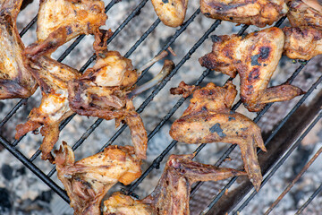 fried appetizing wings on the wire rack are fried. High quality photo