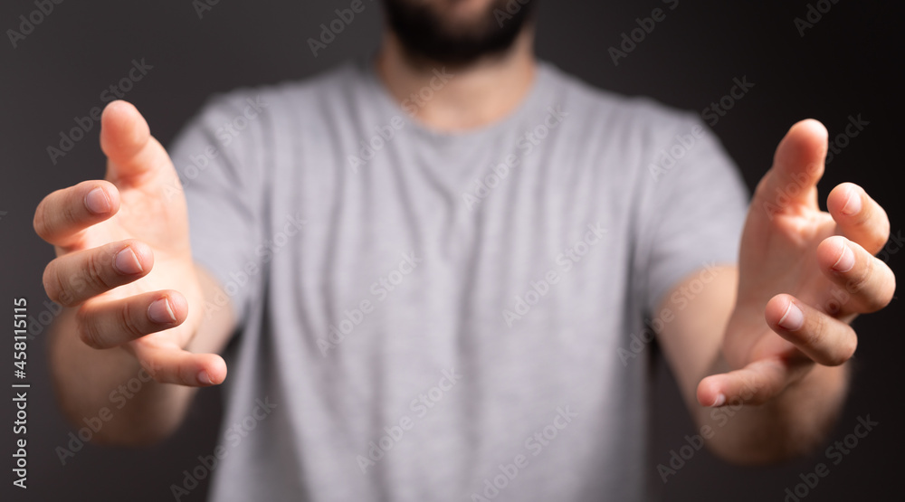 Poster man showing his empty hand.