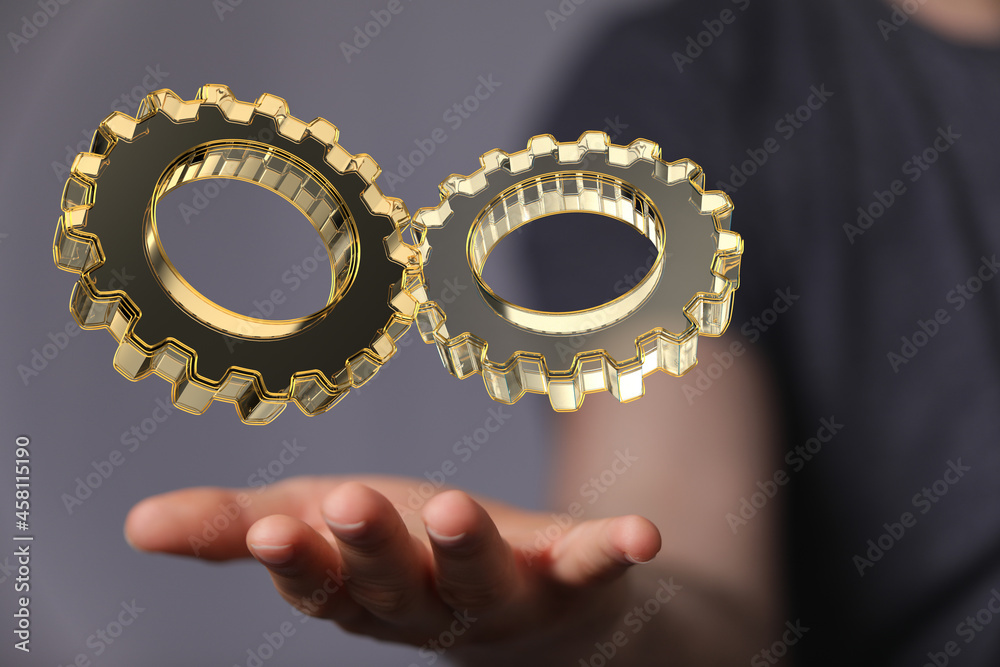 Poster Man draws gears on virtual screen. Blurred Abstract engine room..