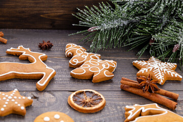 Homemade christmas gingerbread cookies on wooden table.