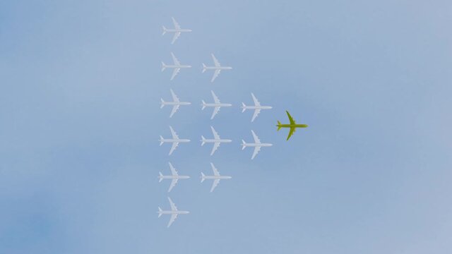 passenger planes are flying like a wedge against the blue sky. leader concept. golden plane ahead. 3d render loop animation