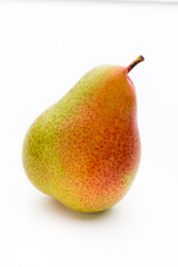 Fresh bio pear with leaves on isolated white background.