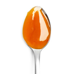 Chili sauce in spoon isolated on white background. Close up, top view.