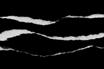 Paper tear, ripped paper edge, torn edge, isolated paper tear white on black, paper corner with space for copy