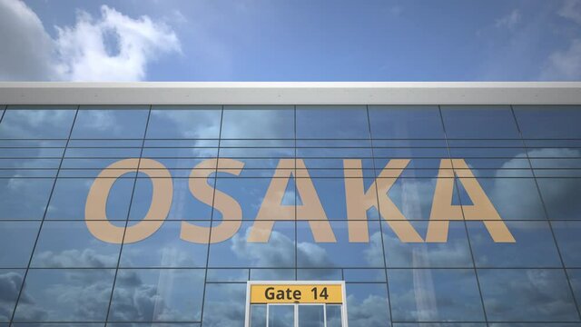 Plane reflects in the airport terminal with OSAKA city name