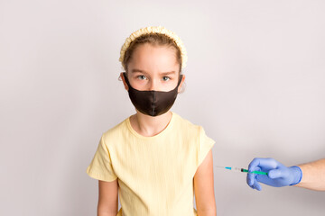 A nurse is giving vaccinations to patients with a syringe. White background. Close-up shot of...