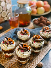 Homemade trifle with cream cheese, chocolate, jelly and berries.