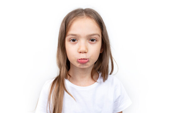 Child showing anger or frustration. The girl is pouting.